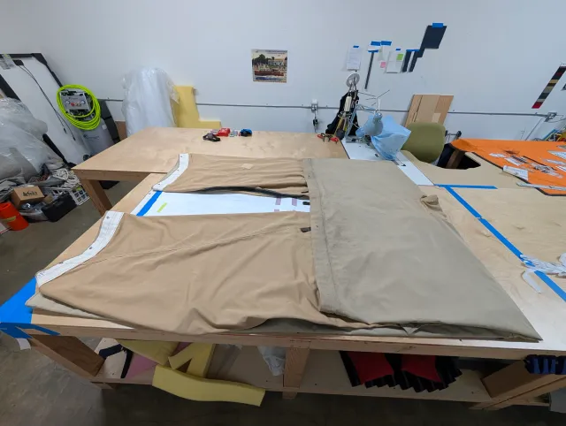 The aft deck cover laid out on the loft's cutting table.