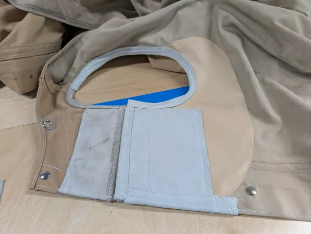 New leather reinforcement and chafe protection for the mooring lines, with snaps along its edge.